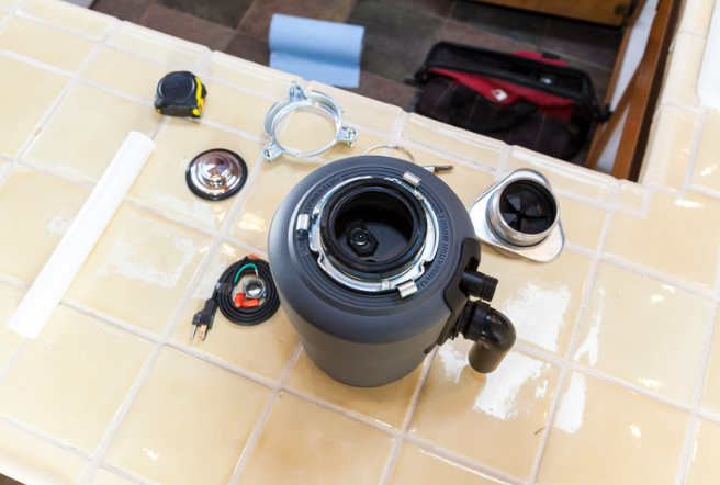 garbage disposal repair Willow TX